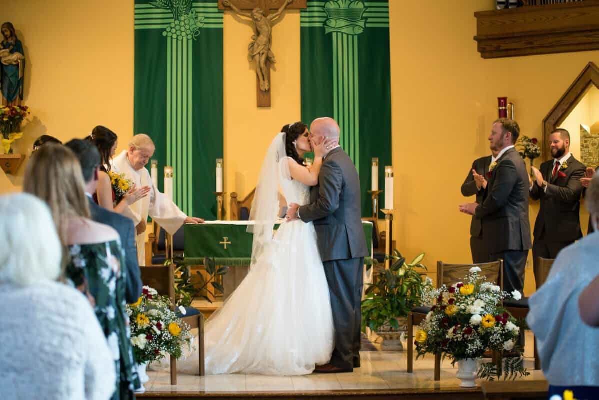 Bride and groom kiss at a Hudson Valley Wedding At West Hills Country Club In Middletown, New York