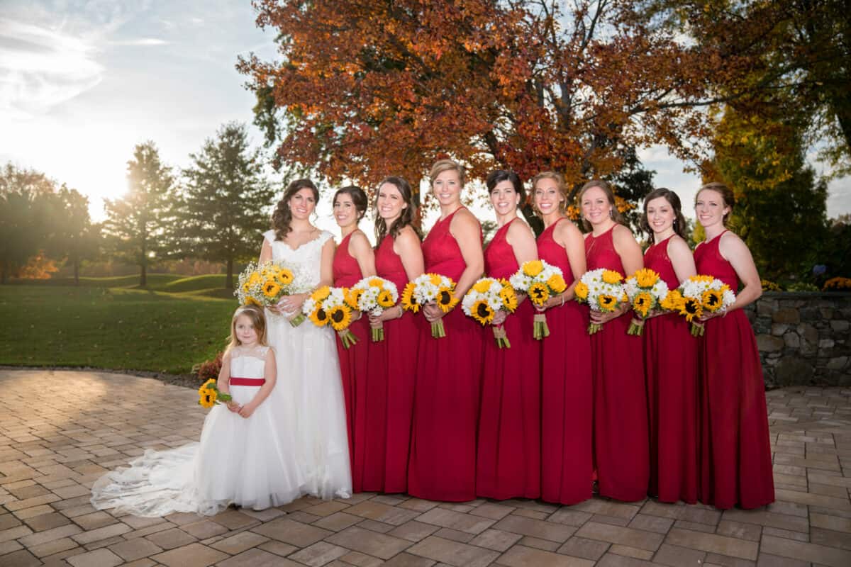 Bride poses with Bridesmaids at a Hudson Valley Wedding At West Hills Country Club In Middletown, New York