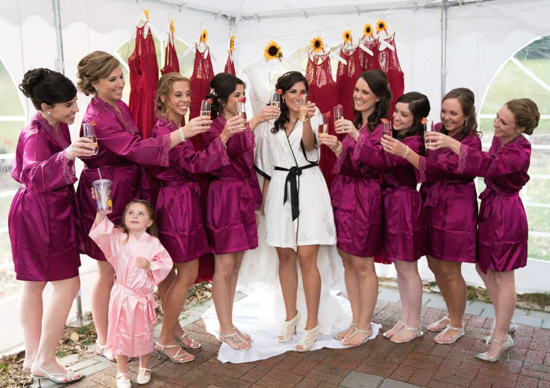 Brides and bridesmaids toasts before her Hudson Valley Wedding At West Hills Country Club In Middletown, New York