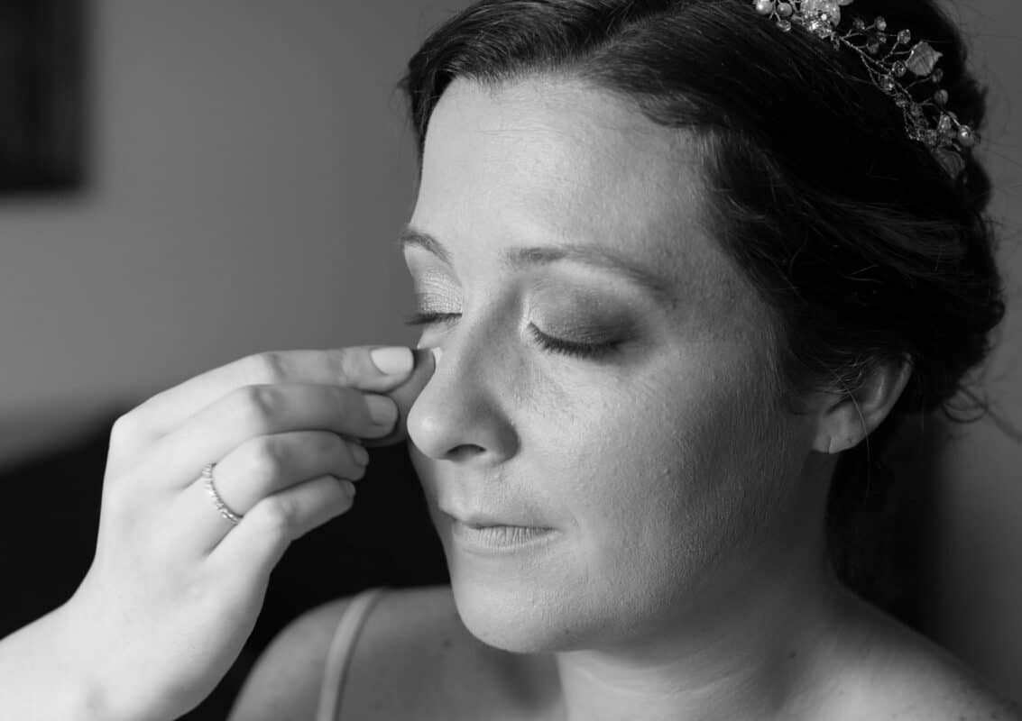 Bride gets make up before Hudson Valley Wedding at Nostranos Vineyard