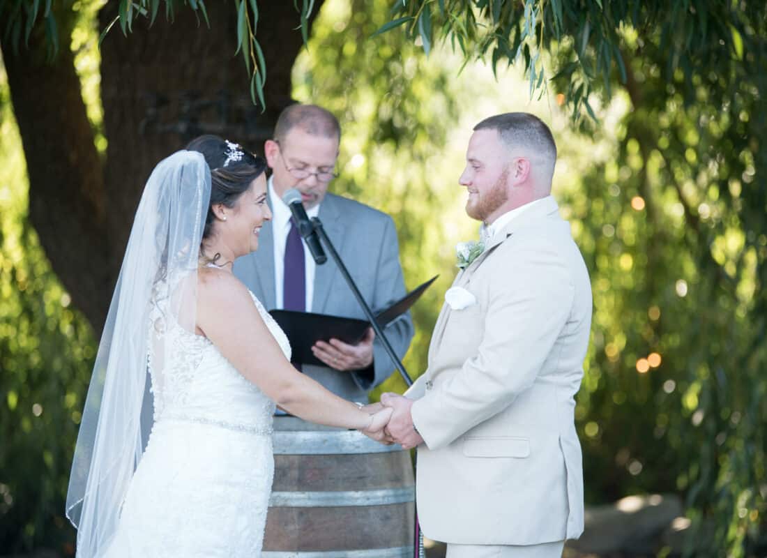 Bride and groom at alter at Hudson Valley Wedding at Nostranos Vineyard