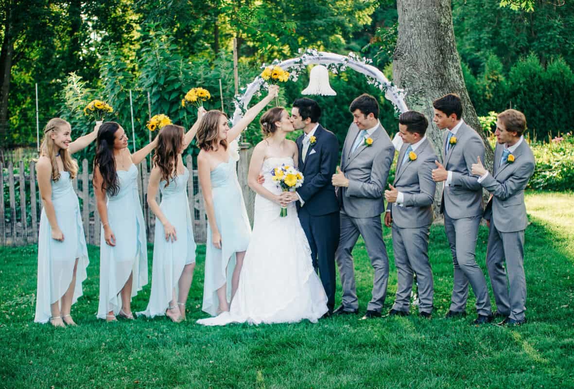 Melissa and Jonathan Kiss with Bridal Party after their Hudson Valley Ceremony At Locust Grove in Poughkeepsie