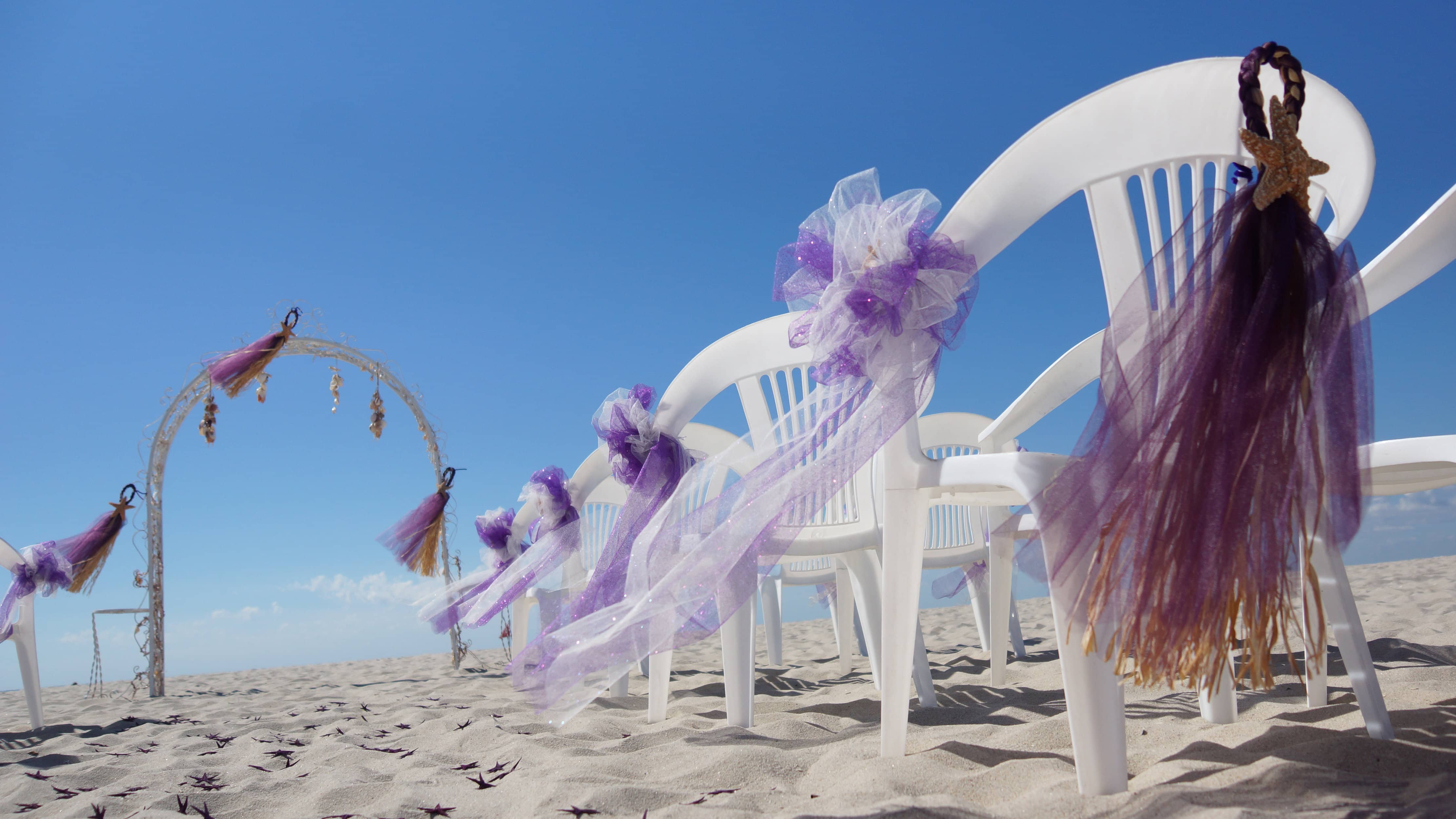 Ceremony on the beach at their Cape May Wedding at Panicos Bistro