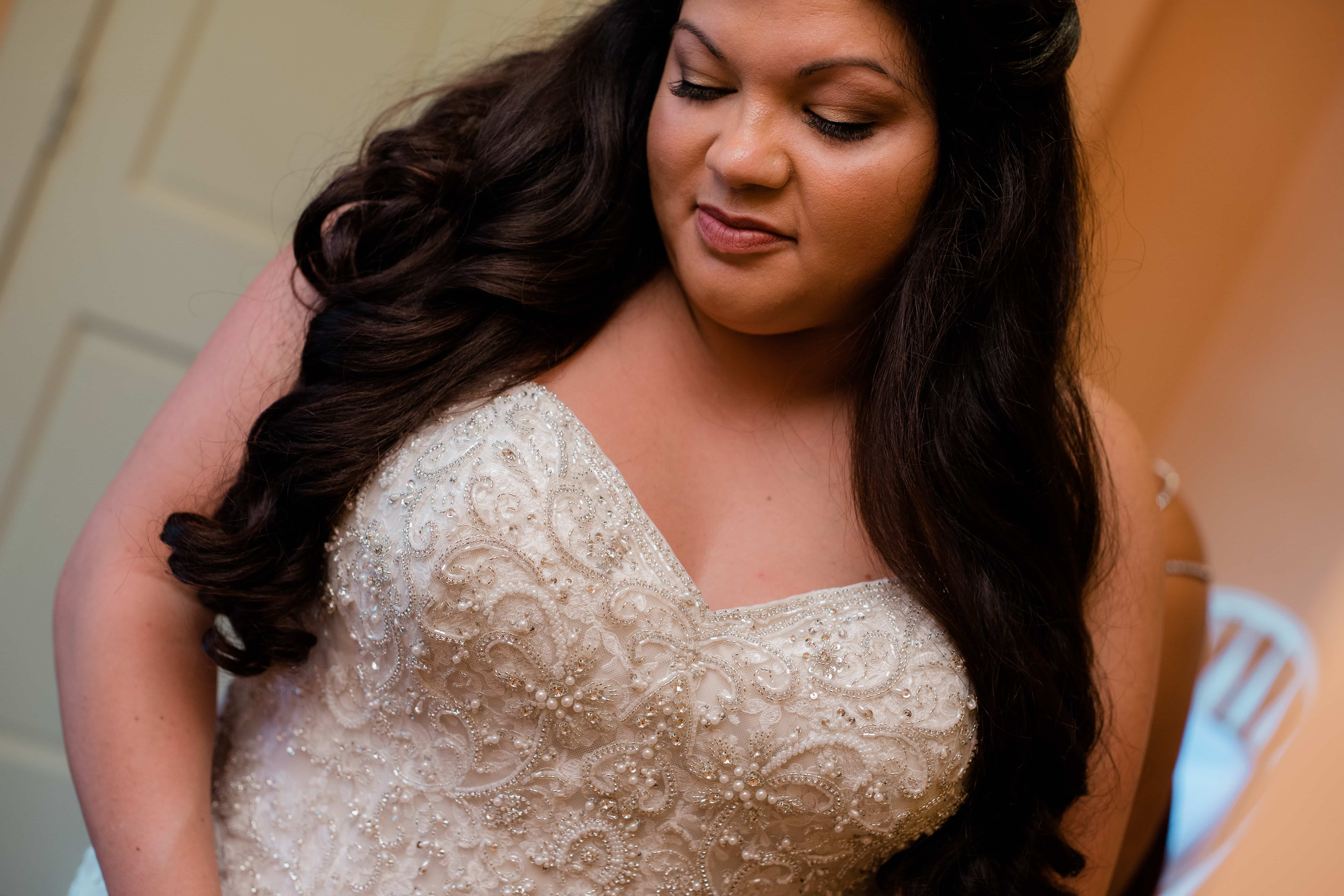 Bride poses with wedding dress at a Hudson Valley Wedding at Brotherhood Winery