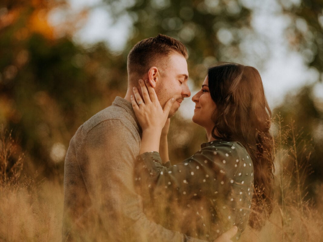 Bride holds Groom at Sunset at Long Dock Park Engagement Photography in the Hudson Valley