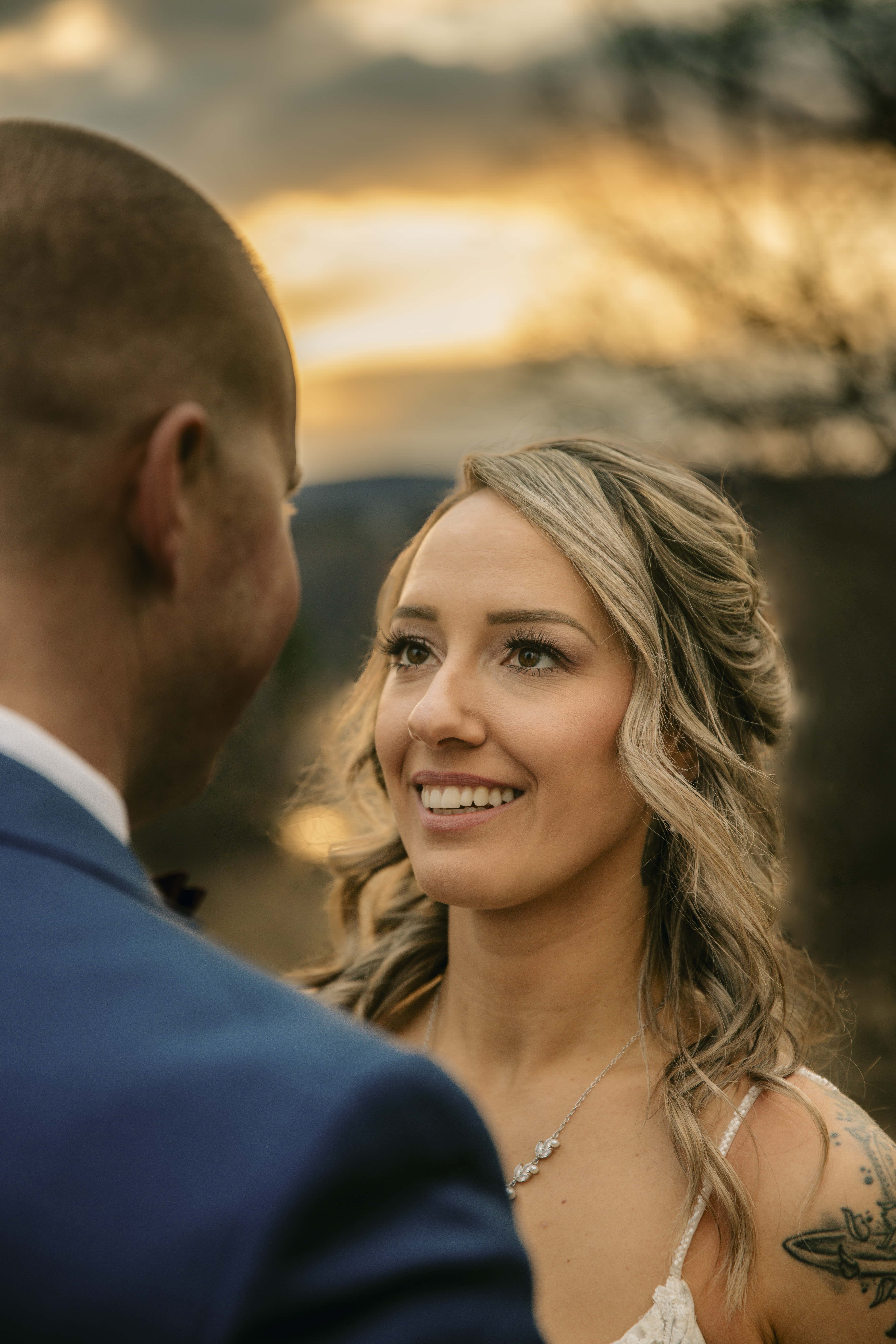 Bride smiles at her husband at a Hudson Valley Wedding at Locust Grove Estate