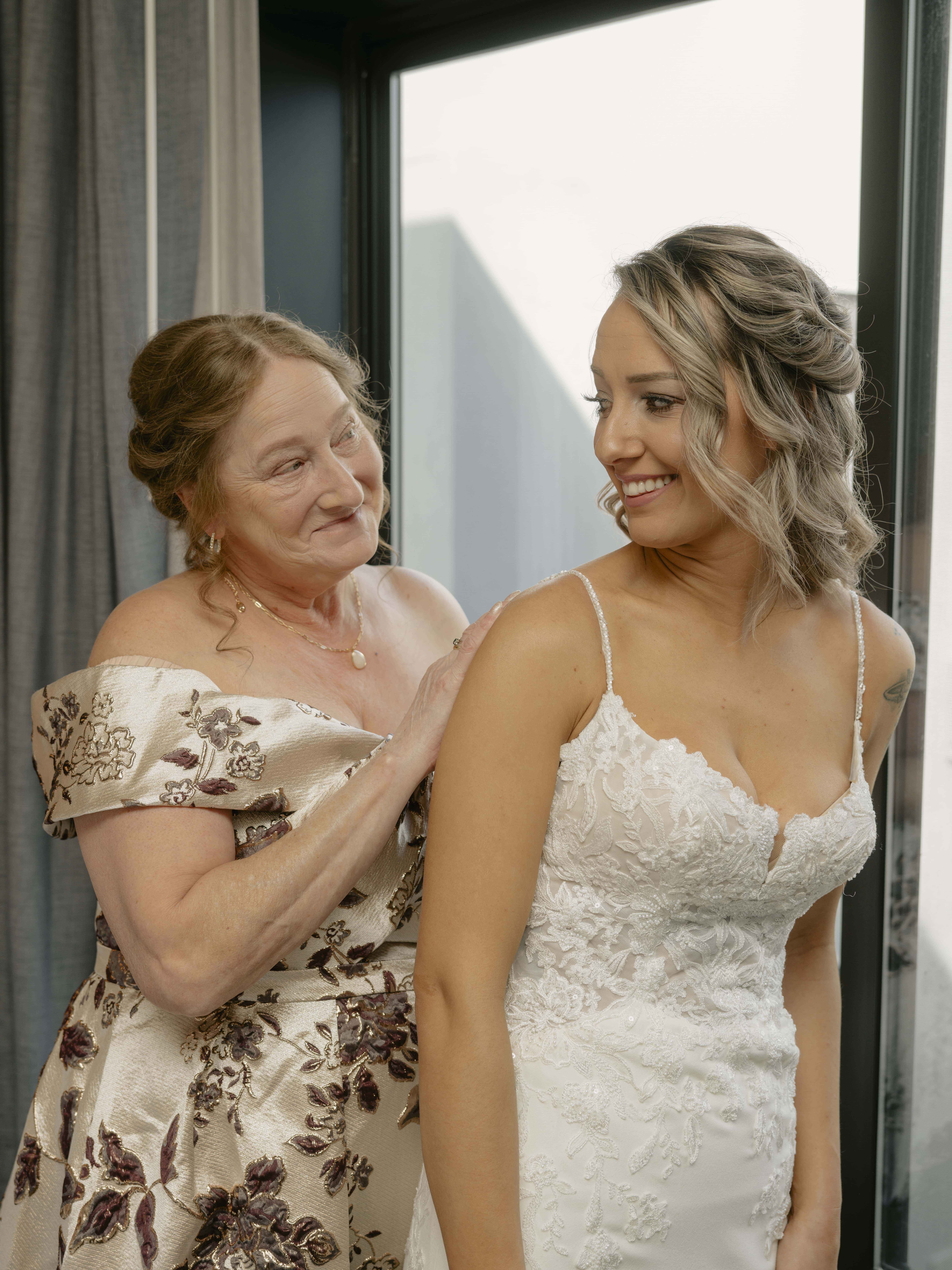 Mother helps Bride while Getting Ready at a Hudson Valley Wedding at Locust Grove Estate