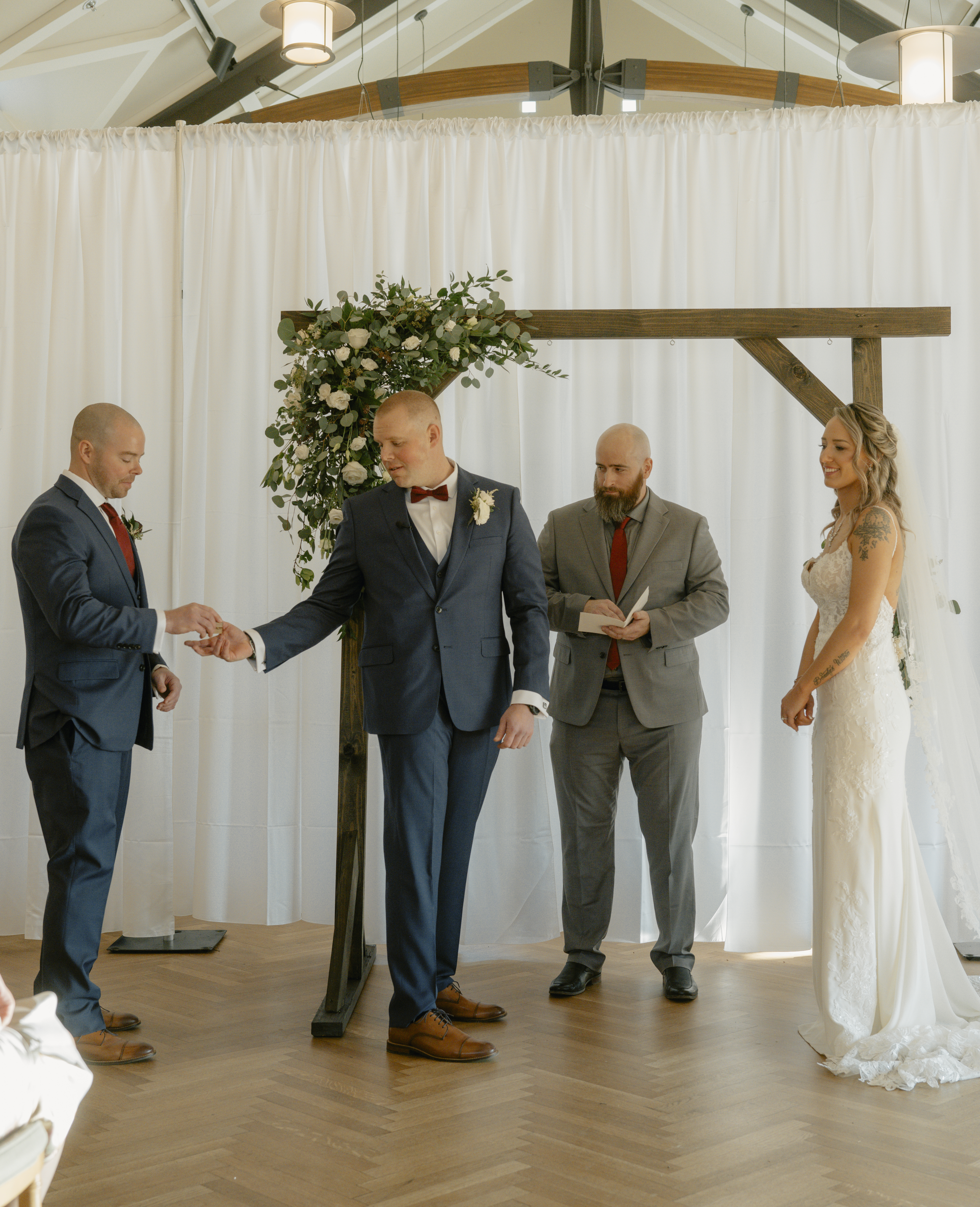 Groom grabs Rings during Ceremony at a Hudson Valley Wedding at Locust Grove Estate