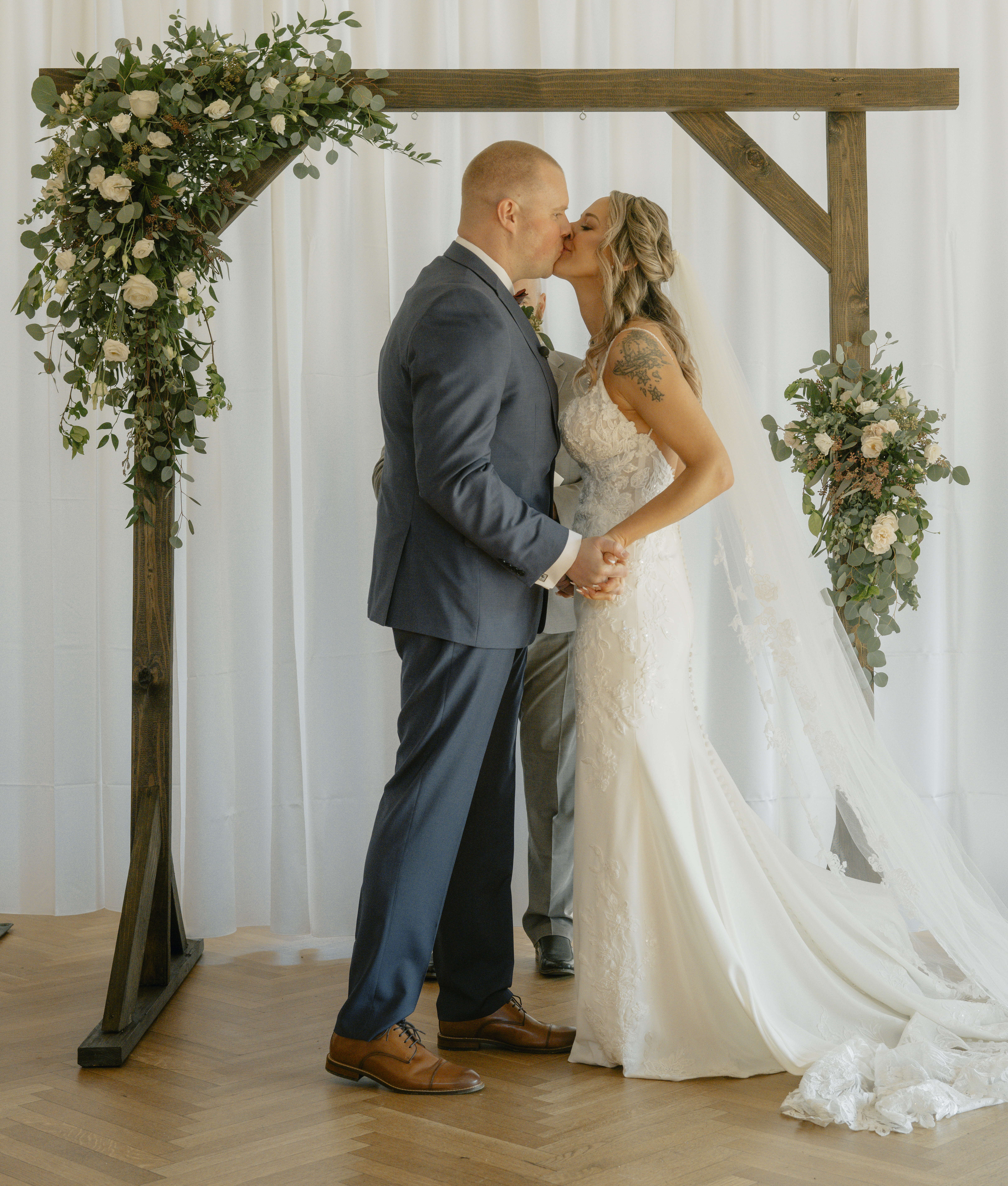 Bride and Groom kiss during Ceremony at a Hudson Valley Wedding at Locust Grove Estate