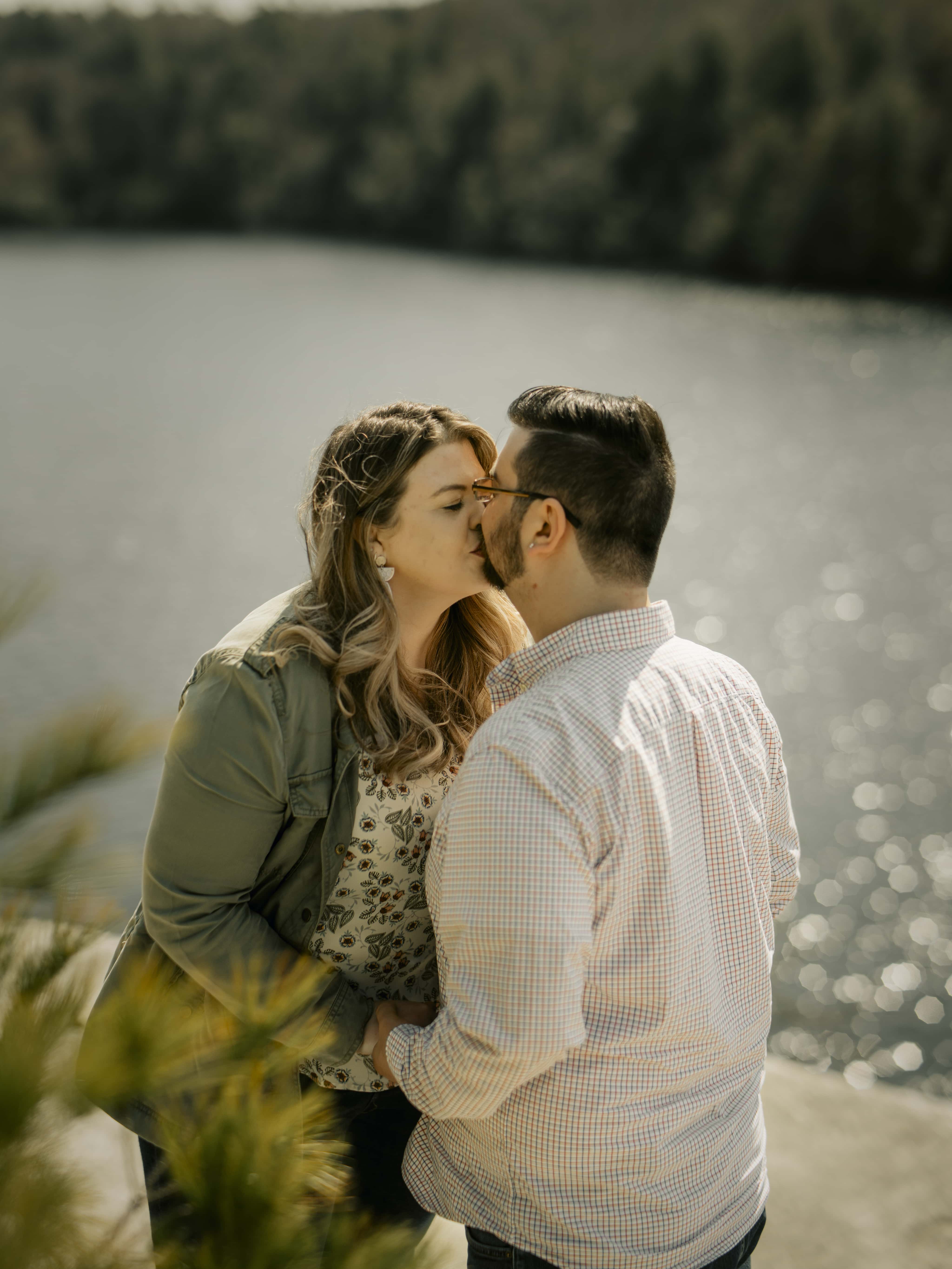 Bride and Groom Kiss for Lake Minnewaska Engagement Photos in The Hudson Valley