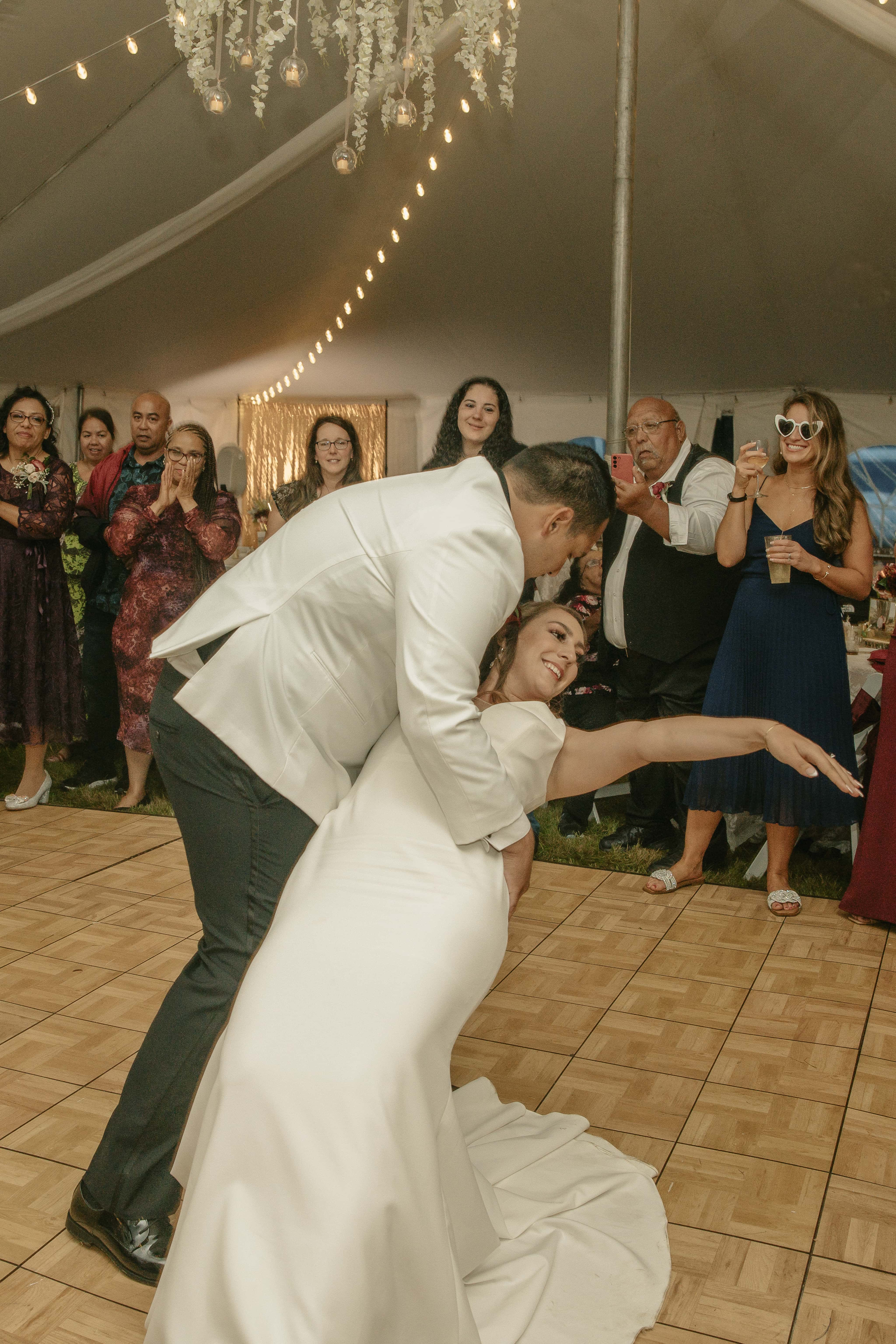 Groom dips bride during reception at an Upstate New York Wedding in the Hudson Valley