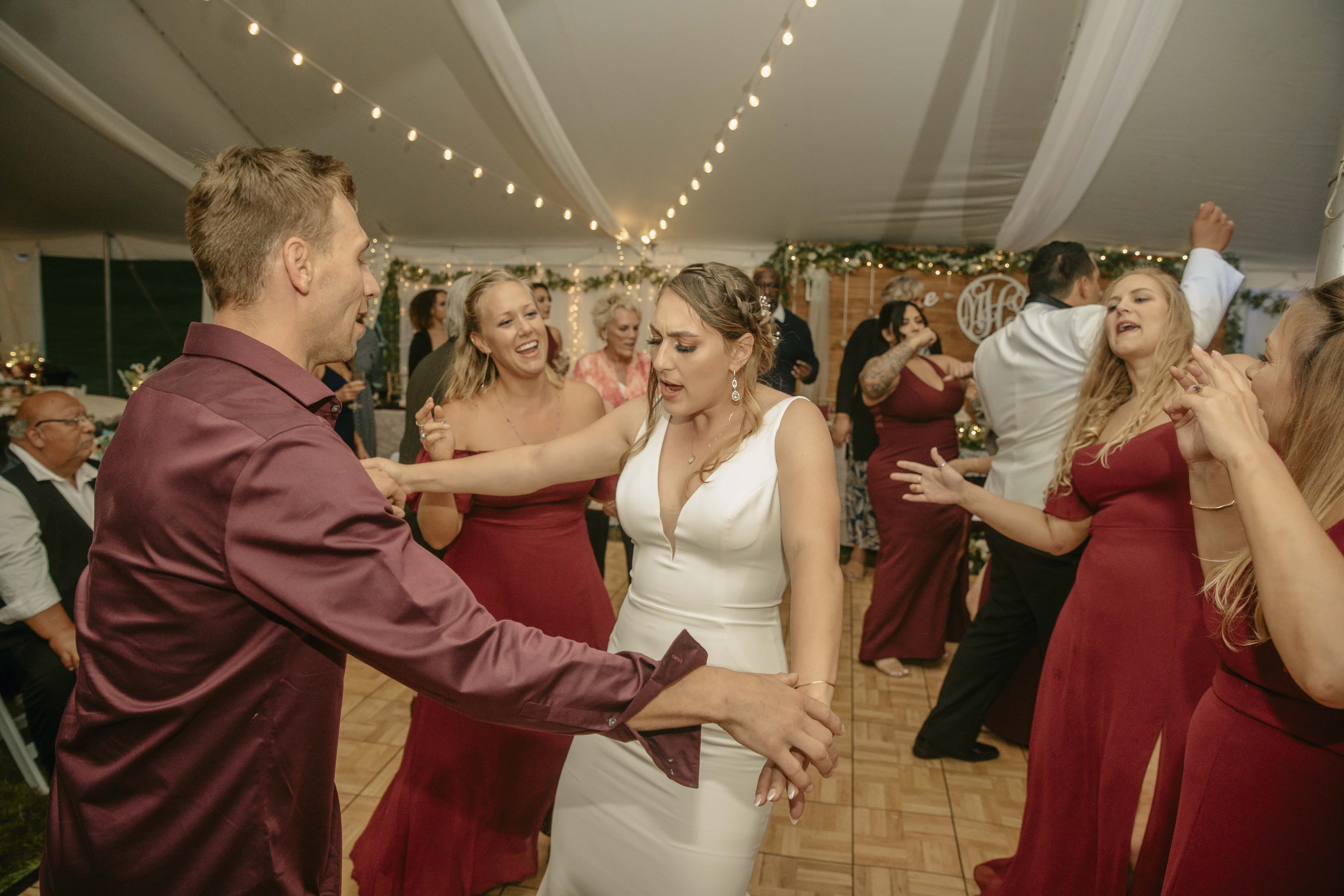 Bride dances with brother during reception at an Upstate New York Wedding in the Hudson Valley