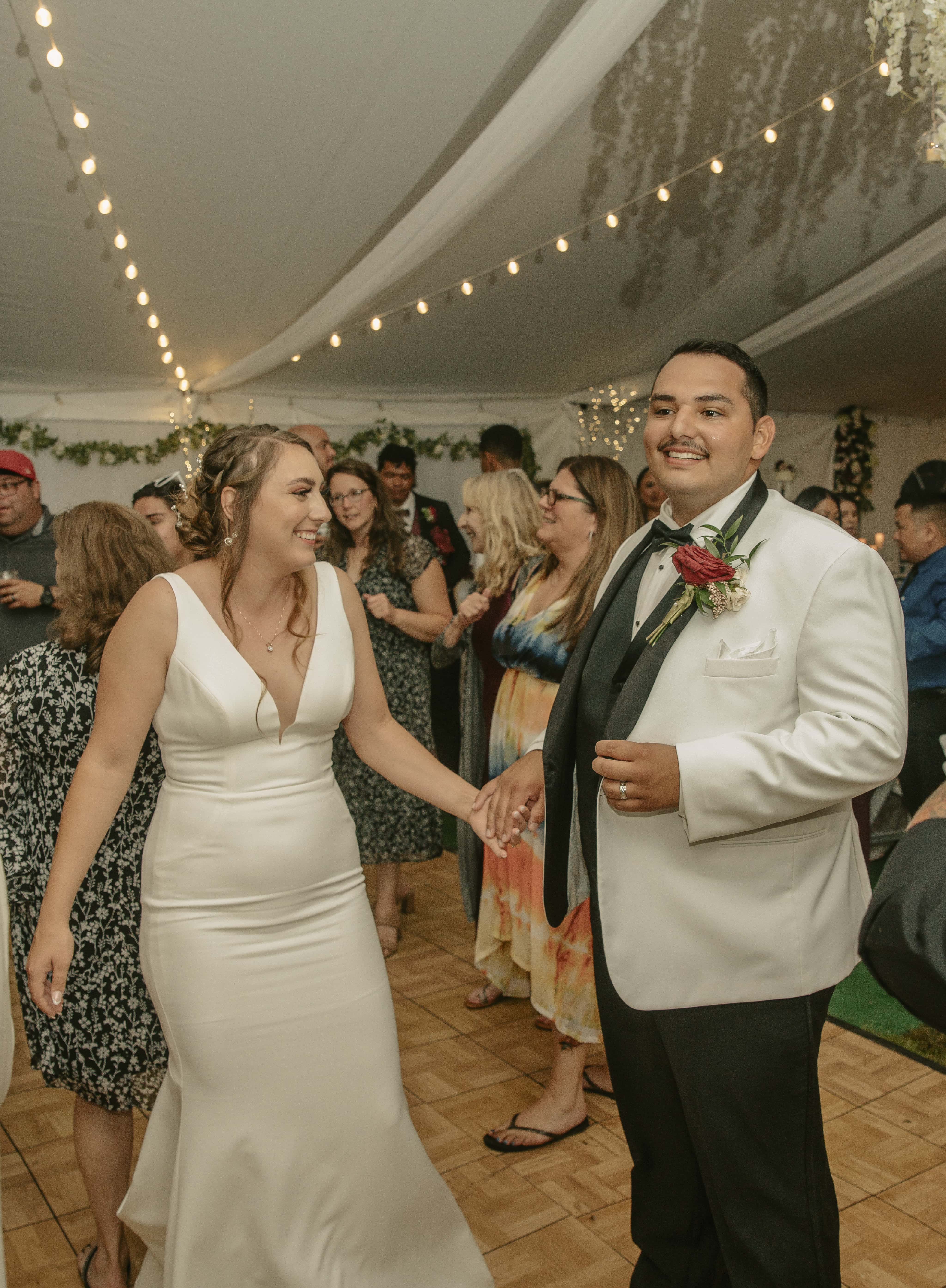 Bride dances groom smiles during reception at an Upstate New York Wedding in the Hudson Valley
