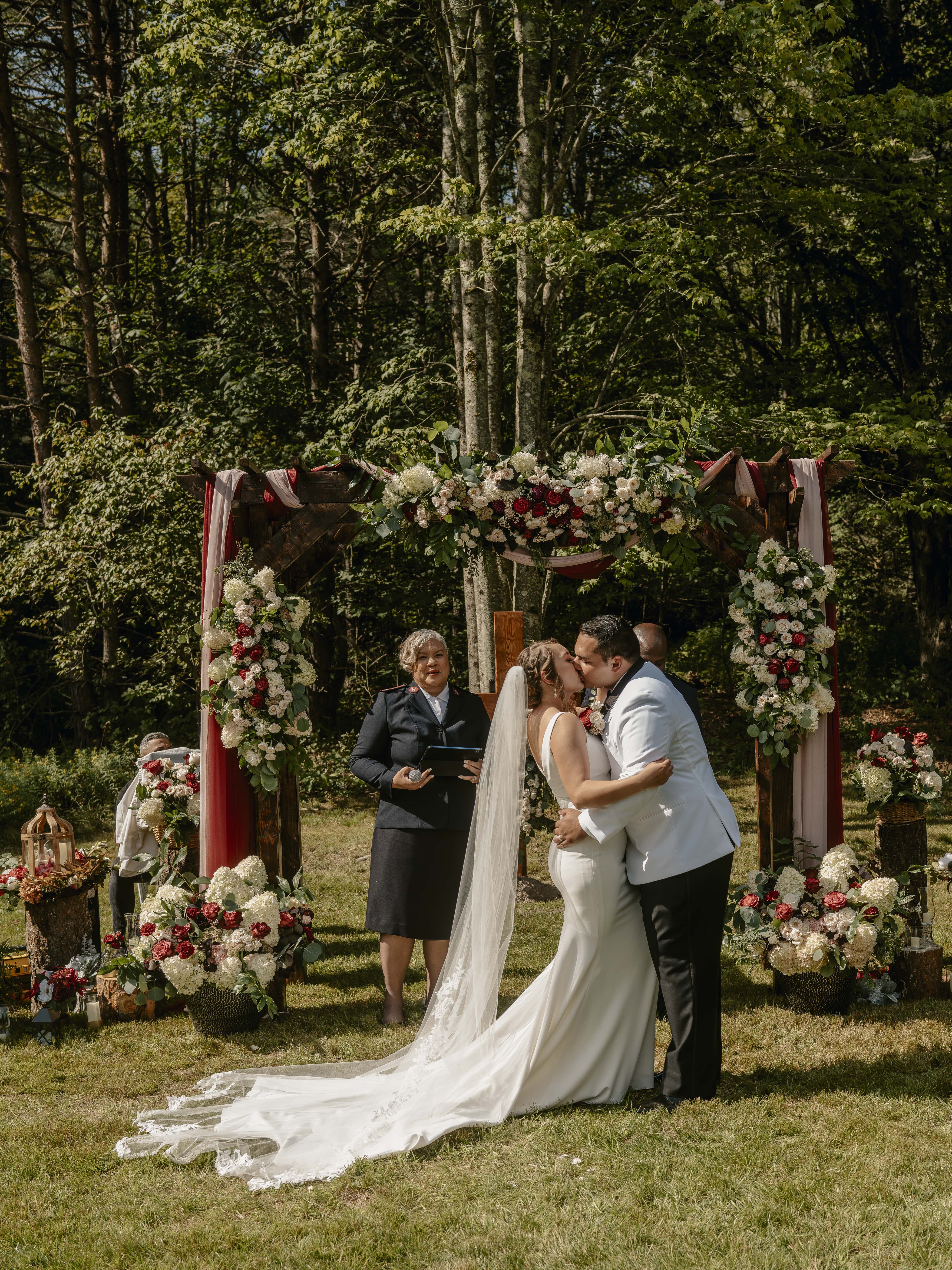 Bride and Groom Kiss during Ceremony at an Upstate New York Wedding in the Hudson Valley