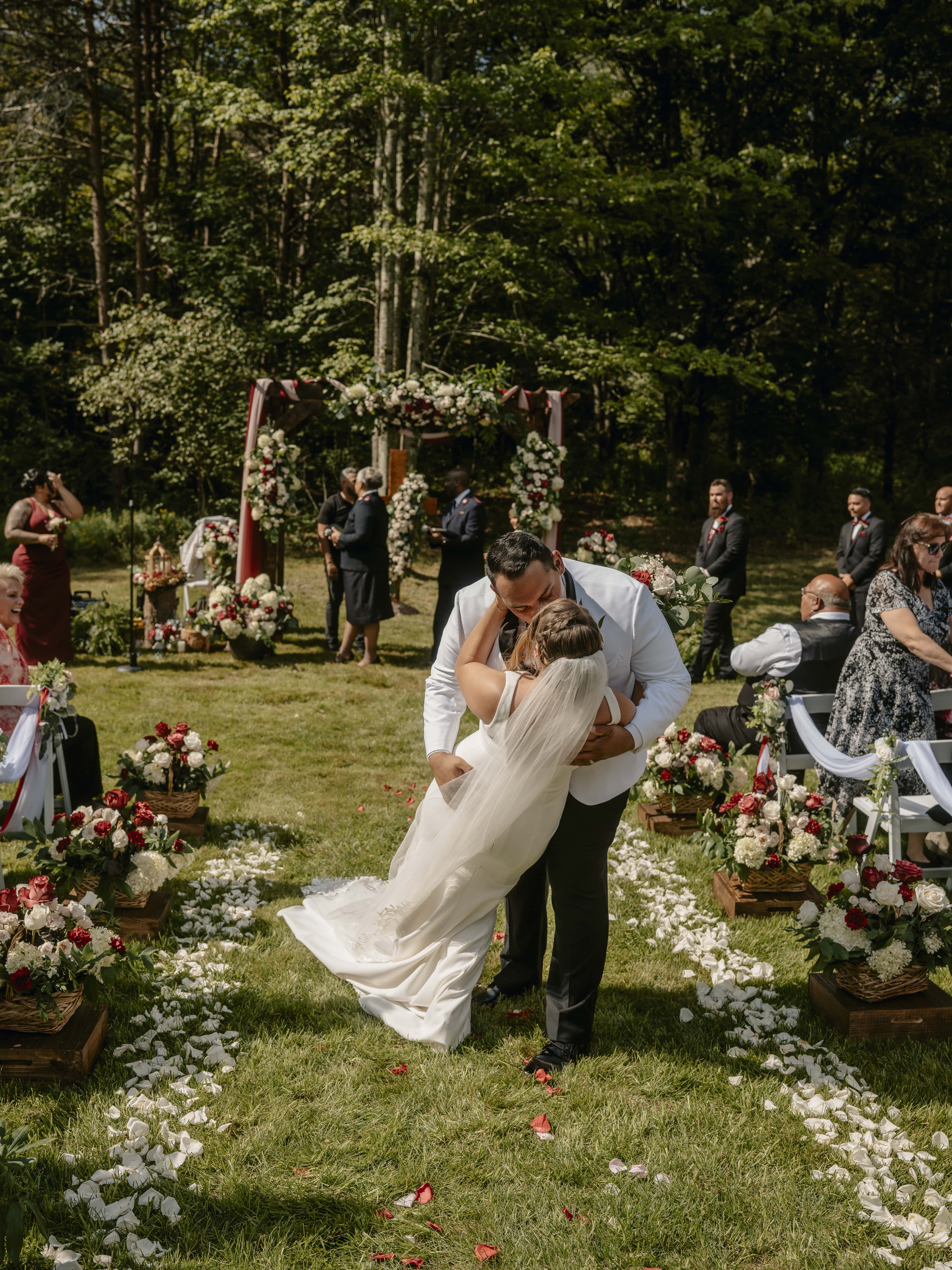 Groom dips bride during Ceremony at an Upstate New York Wedding in the Hudson Valley
