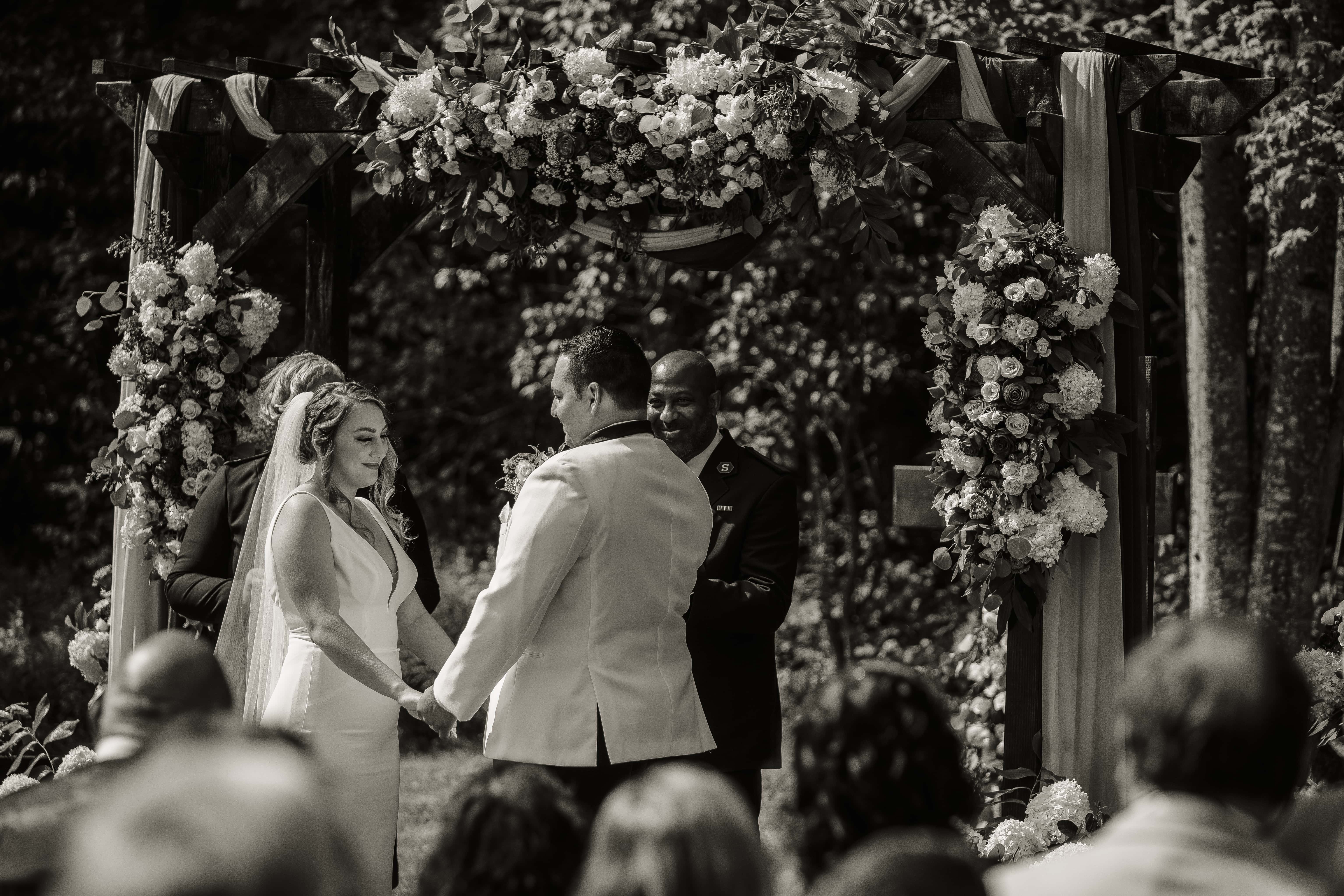 Black and White Photo of Bride Smiling at Groom at an Upstate New York Wedding in the Hudson Valley