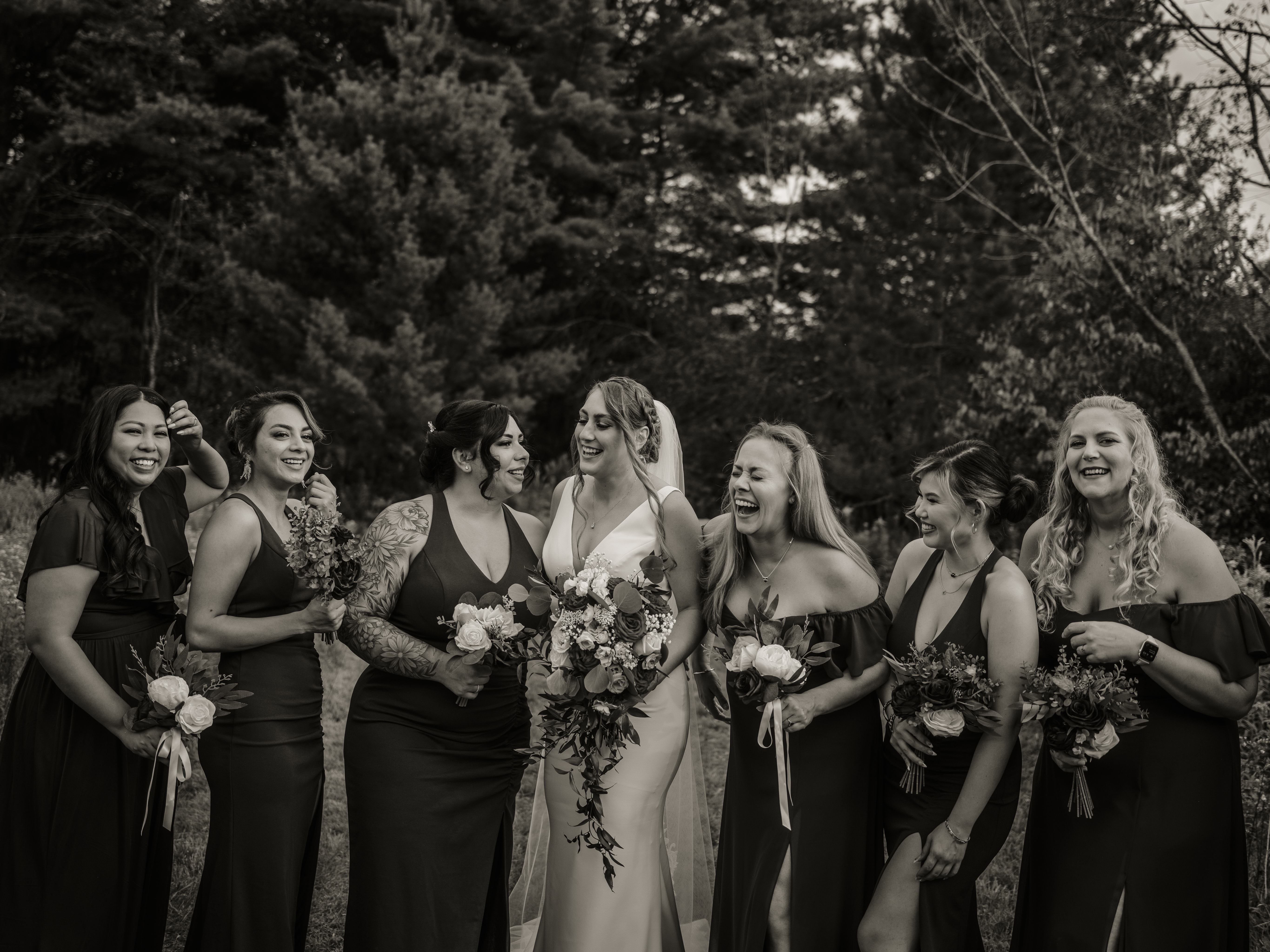 Black and White Photo of Bride and Bridesmaids Laughing at an Upstate New York Wedding in the Hudson Valley