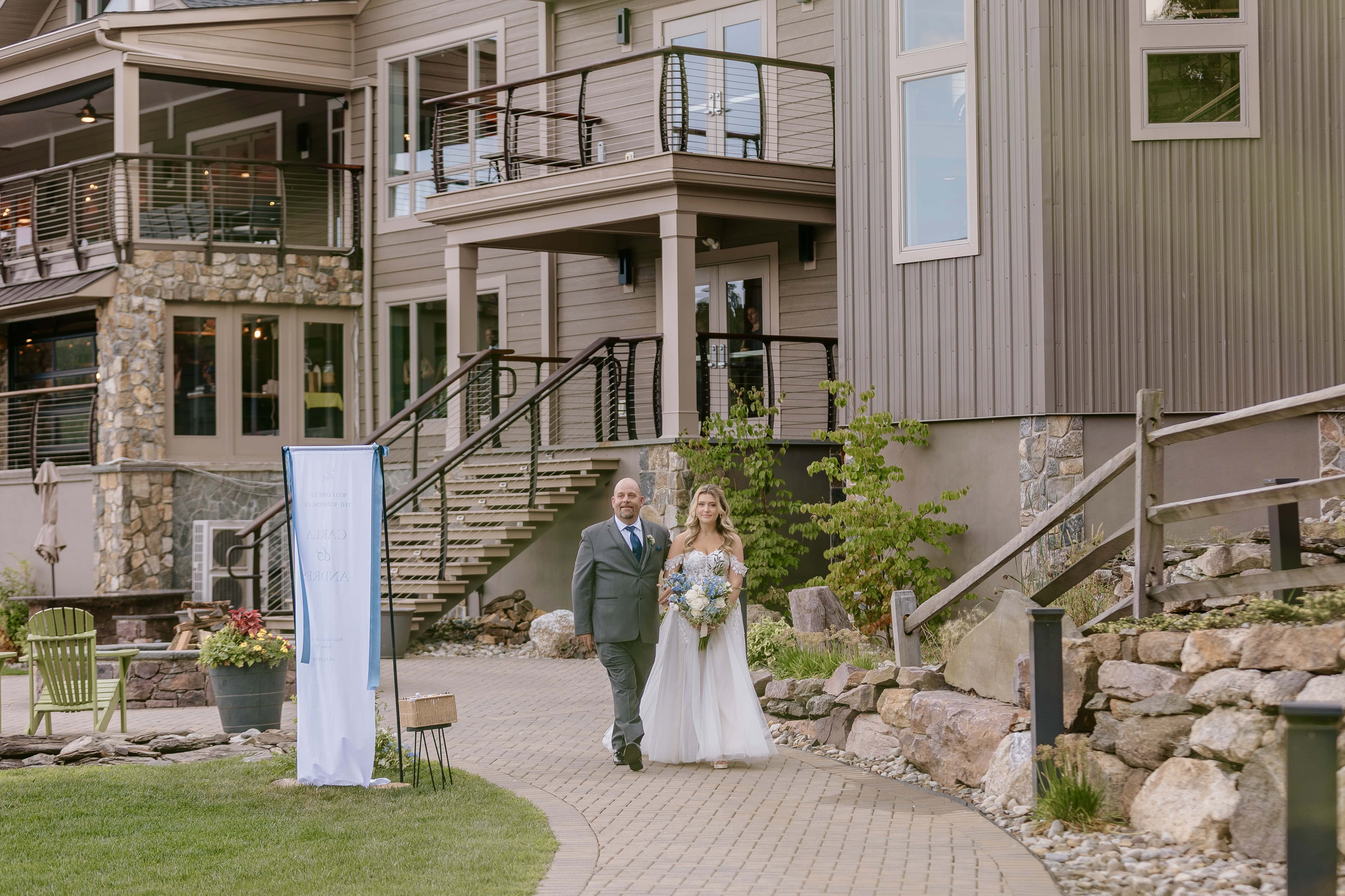 Bride walks down aisle with Father for a New Jersey Wedding Photo at Rock island Lake Club