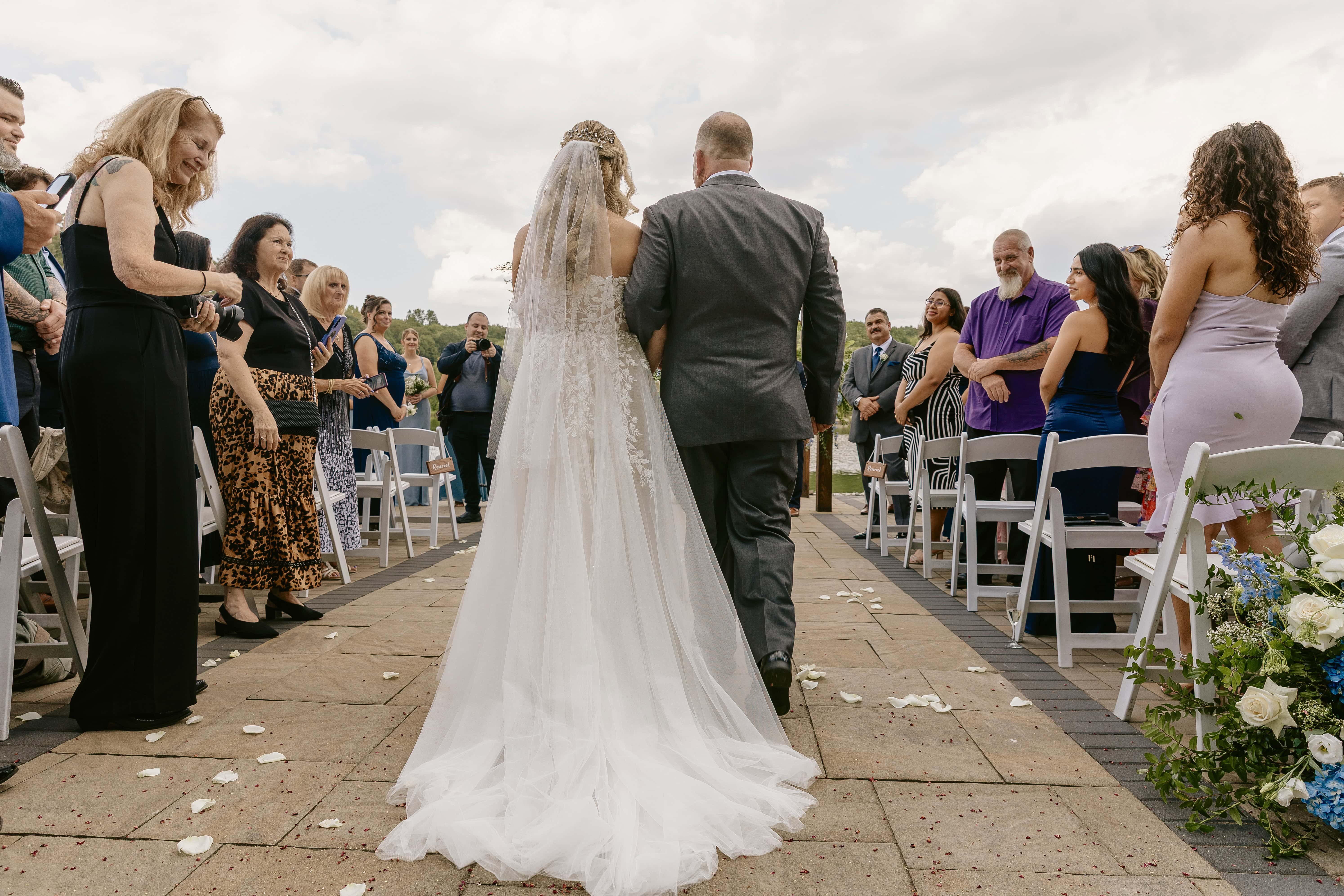 Bride walks down aisle for a New Jersey Wedding Photo at Rock island Lake Club