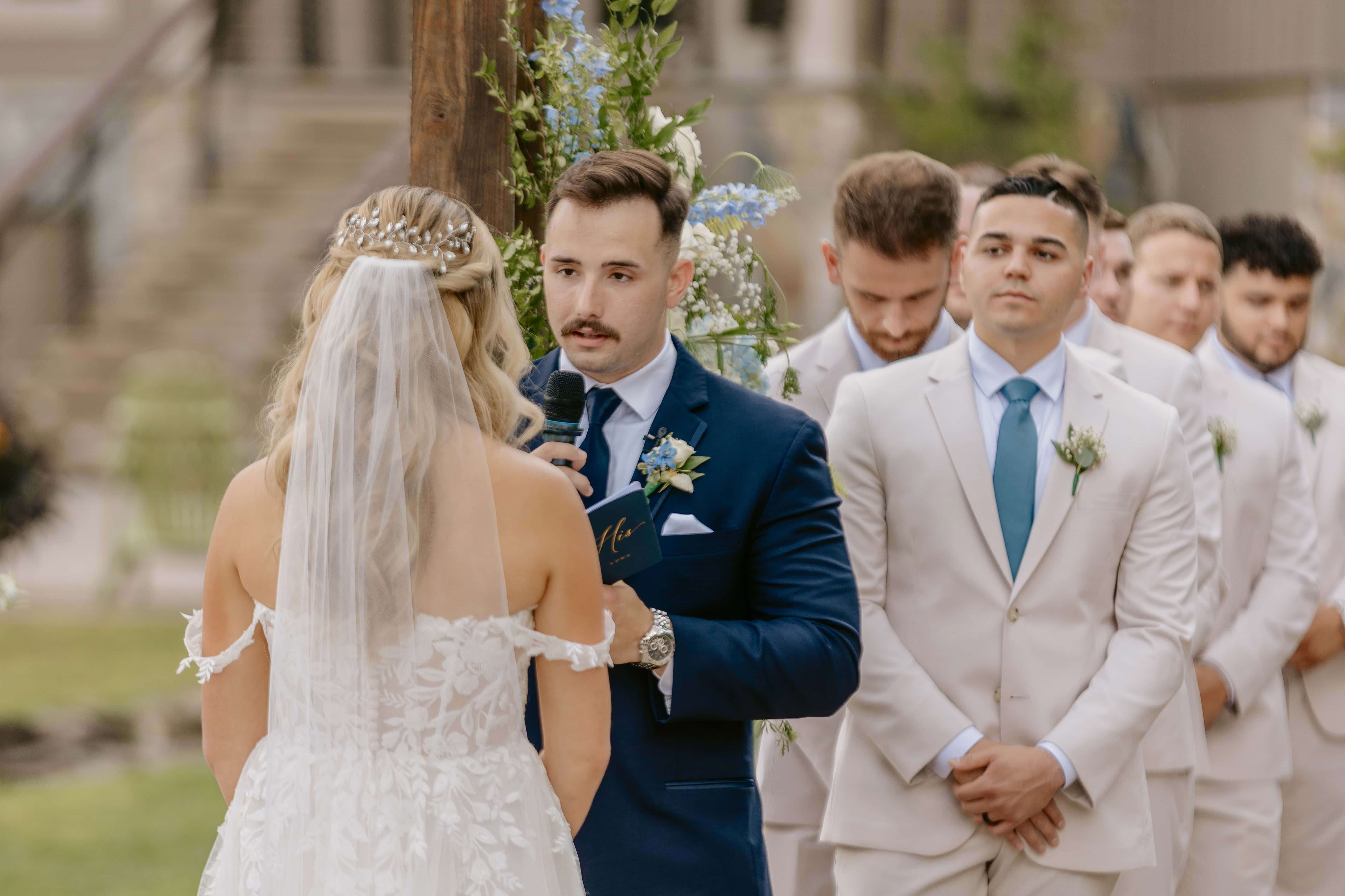 Groom reads vows during Ceremony for a New Jersey Wedding Photo at Rock island Lake Club