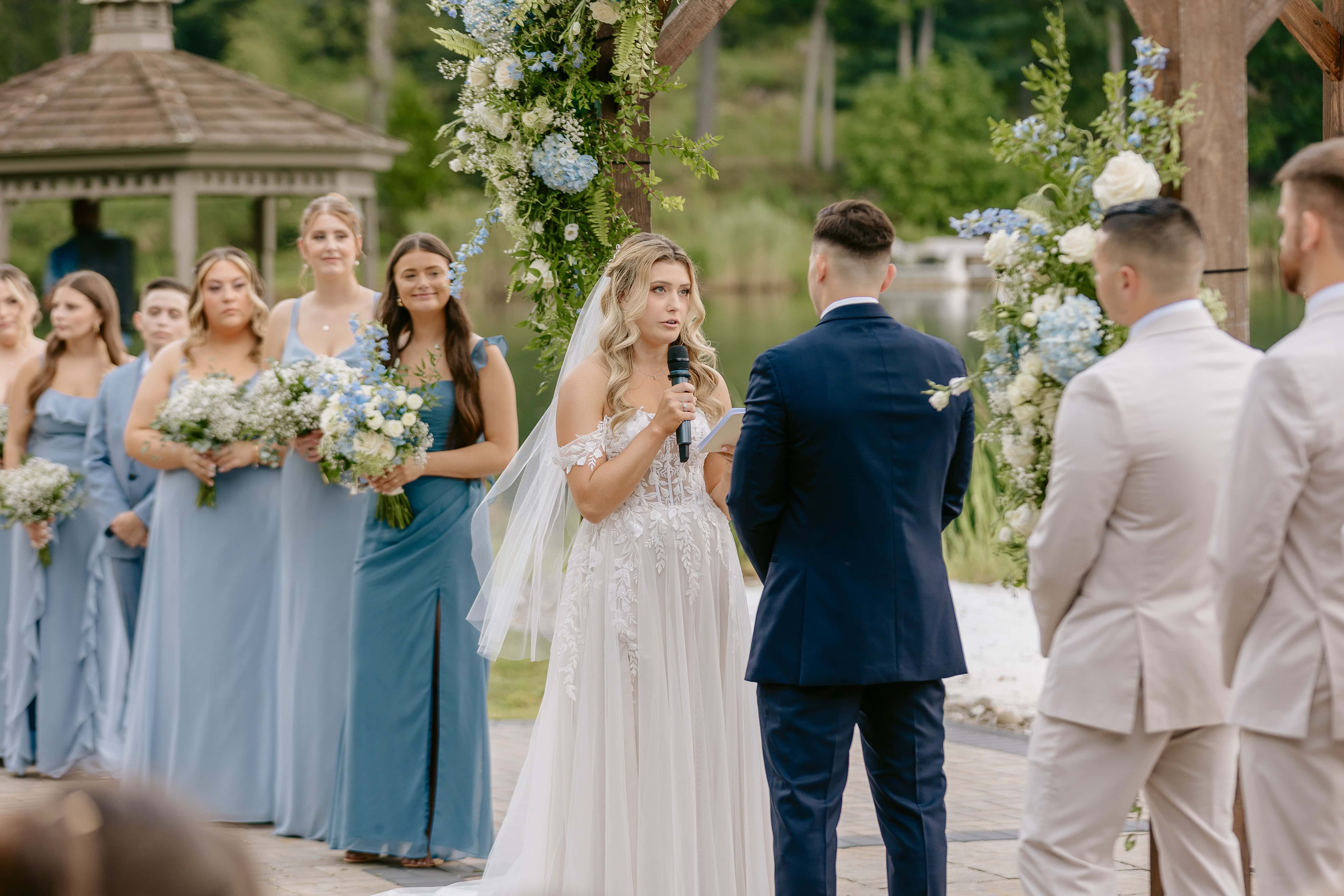 Bride reads vows during Ceremony for a New Jersey Wedding Photo at Rock island Lake Club
